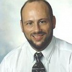 TOM ANDREWS